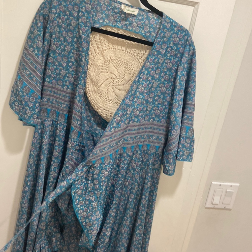 Blue beautiful dress with detail on the back
